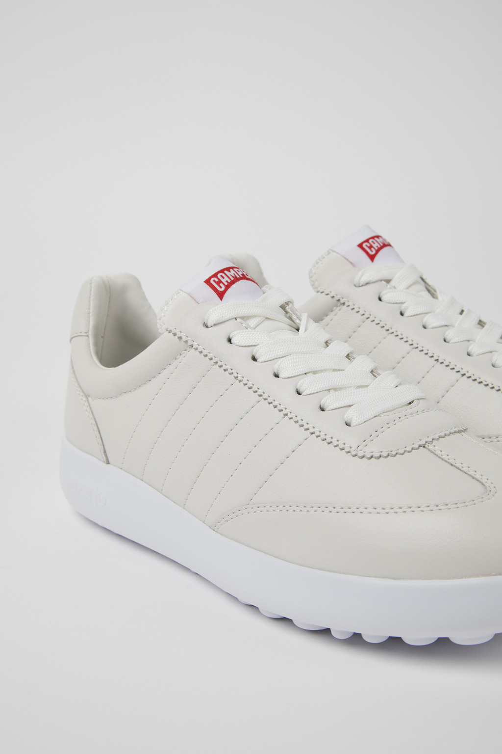 Pelotas XLF White Leather and Textile Sneakers for Women.