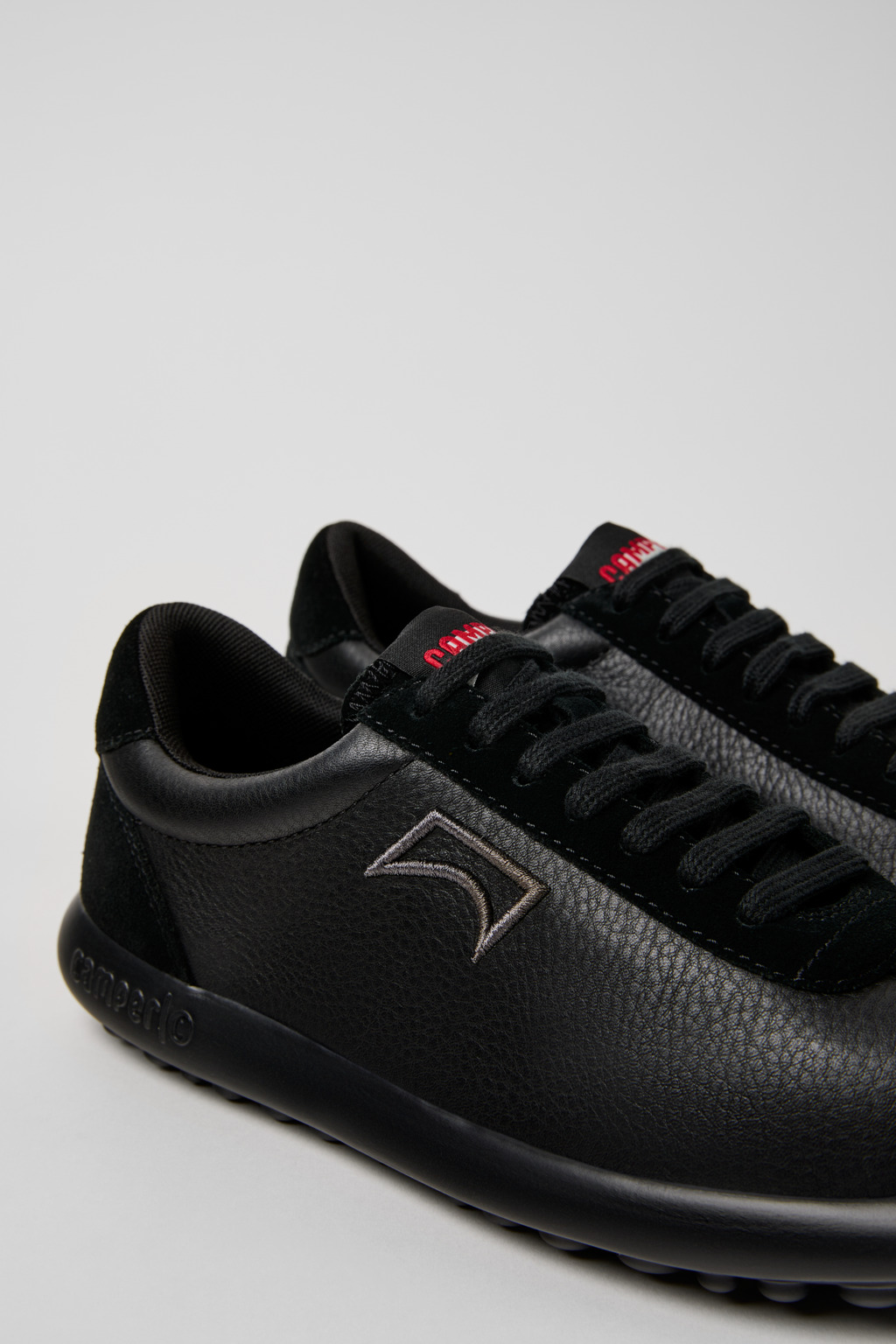 Pelotas XLF Black Leather and Nubuk Sneakers for Women.